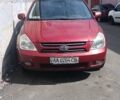 Красный Киа Карнивал, объемом двигателя 2.9 л и пробегом 350 тыс. км за 3000 $, фото 1 на Automoto.ua