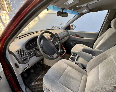 Красный Киа Карнивал, объемом двигателя 2.9 л и пробегом 250 тыс. км за 6000 $, фото 12 на Automoto.ua