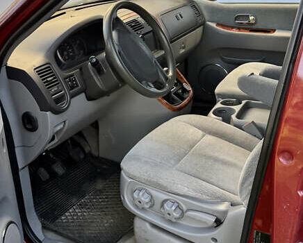 Красный Киа Карнивал, объемом двигателя 2.9 л и пробегом 250 тыс. км за 6000 $, фото 11 на Automoto.ua