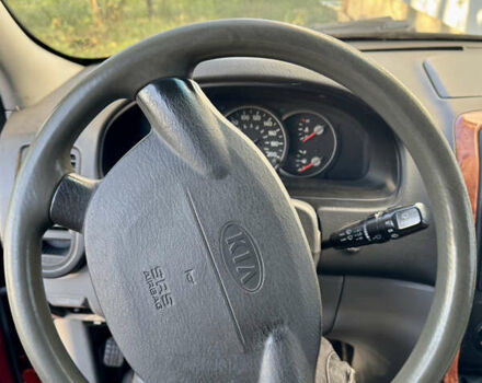 Красный Киа Карнивал, объемом двигателя 2.9 л и пробегом 250 тыс. км за 6000 $, фото 8 на Automoto.ua