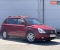 Красный Киа Карнивал, объемом двигателя 2.9 л и пробегом 296 тыс. км за 8990 $, фото 1 на Automoto.ua