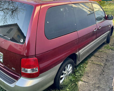 Красный Киа Карнивал, объемом двигателя 2.9 л и пробегом 250 тыс. км за 6000 $, фото 2 на Automoto.ua