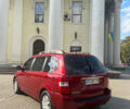 Красный Киа Карнивал, объемом двигателя 2.9 л и пробегом 300 тыс. км за 6500 $, фото 4 на Automoto.ua