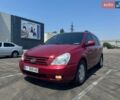Красный Киа Карнивал, объемом двигателя 2.9 л и пробегом 220 тыс. км за 6300 $, фото 1 на Automoto.ua