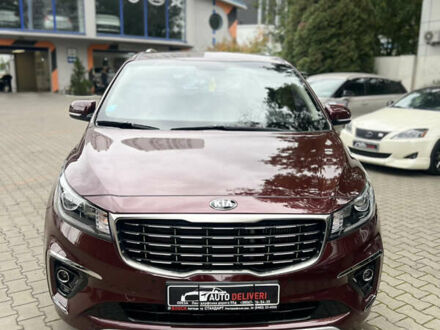 Красный Киа Карнивал, объемом двигателя 2.2 л и пробегом 118 тыс. км за 22500 $, фото 1 на Automoto.ua