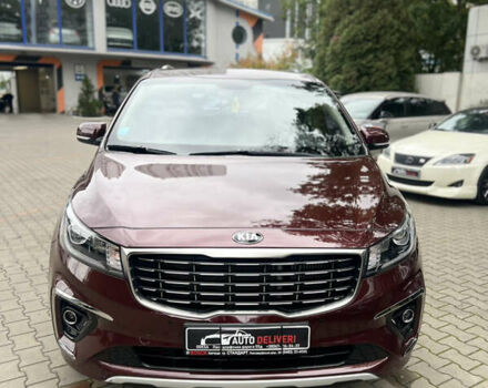 Красный Киа Карнивал, объемом двигателя 2.2 л и пробегом 118 тыс. км за 22500 $, фото 1 на Automoto.ua