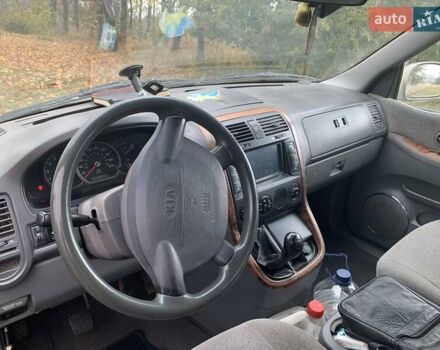 Желтый Киа Карнивал, объемом двигателя 2.9 л и пробегом 350 тыс. км за 4200 $, фото 7 на Automoto.ua