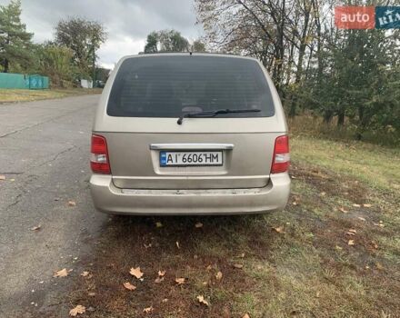 Желтый Киа Карнивал, объемом двигателя 2.9 л и пробегом 350 тыс. км за 4200 $, фото 3 на Automoto.ua