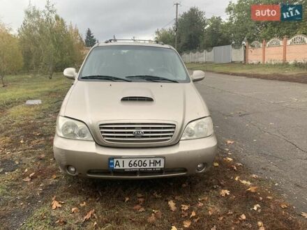 Желтый Киа Карнивал, объемом двигателя 2.9 л и пробегом 350 тыс. км за 4200 $, фото 1 на Automoto.ua