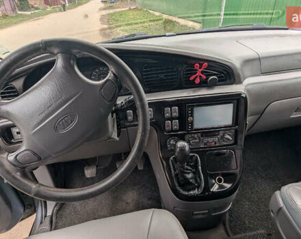 Серый Киа Карнивал, объемом двигателя 2.9 л и пробегом 350 тыс. км за 2150 $, фото 13 на Automoto.ua