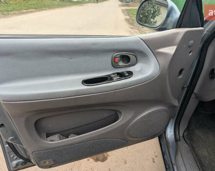 Серый Киа Карнивал, объемом двигателя 2.9 л и пробегом 350 тыс. км за 2150 $, фото 9 на Automoto.ua