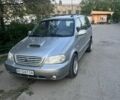 Серый Киа Карнивал, объемом двигателя 2.9 л и пробегом 240 тыс. км за 2200 $, фото 1 на Automoto.ua