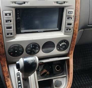 Серый Киа Карнивал, объемом двигателя 2.9 л и пробегом 270 тыс. км за 3450 $, фото 1 на Automoto.ua