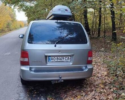 Серый Киа Карнивал, объемом двигателя 2.9 л и пробегом 413 тыс. км за 3700 $, фото 1 на Automoto.ua