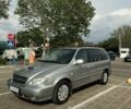 Серый Киа Карнивал, объемом двигателя 2.9 л и пробегом 300 тыс. км за 3900 $, фото 1 на Automoto.ua