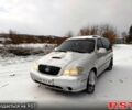 Серый Киа Карнивал, объемом двигателя 29 л и пробегом 235 тыс. км за 2999 $, фото 5 на Automoto.ua