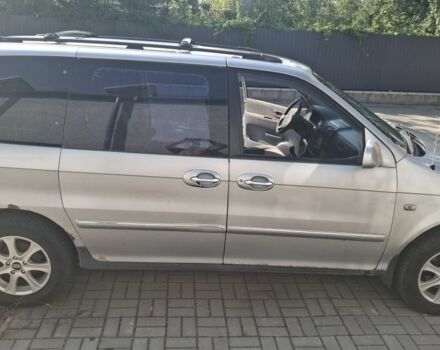 Серый Киа Карнивал, объемом двигателя 2.9 л и пробегом 318 тыс. км за 2021 $, фото 2 на Automoto.ua