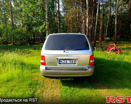 Серый Киа Карнивал, объемом двигателя 3 л и пробегом 302 тыс. км за 2500 $, фото 3 на Automoto.ua