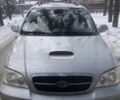 Серый Киа Карнивал, объемом двигателя 2.9 л и пробегом 209 тыс. км за 2000 $, фото 1 на Automoto.ua