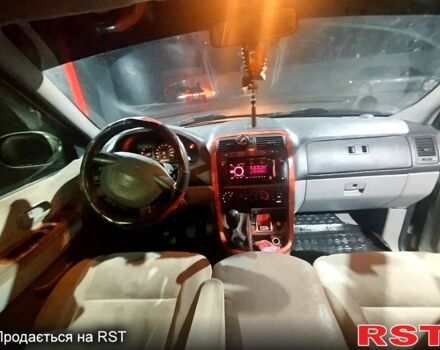 Серый Киа Карнивал, объемом двигателя 29 л и пробегом 235 тыс. км за 2999 $, фото 1 на Automoto.ua