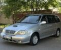 Серый Киа Карнивал, объемом двигателя 2.9 л и пробегом 260 тыс. км за 2350 $, фото 1 на Automoto.ua