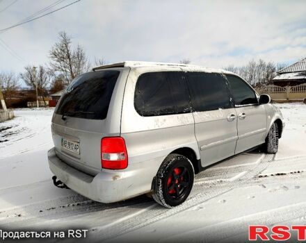 Серый Киа Карнивал, объемом двигателя 29 л и пробегом 235 тыс. км за 2999 $, фото 6 на Automoto.ua