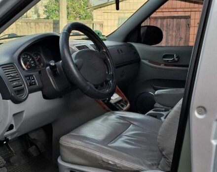 Серый Киа Карнивал, объемом двигателя 2.9 л и пробегом 340 тыс. км за 2129 $, фото 3 на Automoto.ua