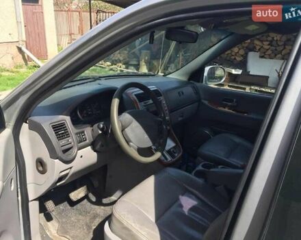 Серый Киа Карнивал, объемом двигателя 2.9 л и пробегом 390 тыс. км за 4800 $, фото 7 на Automoto.ua