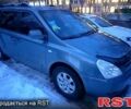 Сірий Кіа Карнівал, об'ємом двигуна 2.92 л та пробігом 215 тис. км за 7800 $, фото 1 на Automoto.ua