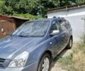 Серый Киа Карнивал, объемом двигателя 3 л и пробегом 162 тыс. км за 4900 $, фото 1 на Automoto.ua