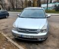 Серый Киа Карнивал, объемом двигателя 2.9 л и пробегом 400 тыс. км за 6800 $, фото 1 на Automoto.ua