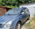 Серый Киа Карнивал, объемом двигателя 2 л и пробегом 167 тыс. км за 5000 $, фото 1 на Automoto.ua