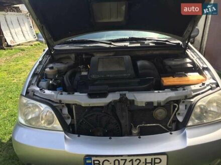 Серый Киа Карнивал, объемом двигателя 2.9 л и пробегом 390 тыс. км за 4800 $, фото 1 на Automoto.ua