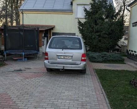 Серый Киа Карнивал, объемом двигателя 2.9 л и пробегом 200 тыс. км за 3300 $, фото 1 на Automoto.ua