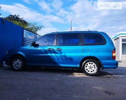 Синій Кіа Карнівал, об'ємом двигуна 2.92 л та пробігом 300 тис. км за 1999 $, фото 4 на Automoto.ua