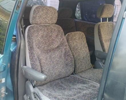 Синій Кіа Карнівал, об'ємом двигуна 2.92 л та пробігом 300 тис. км за 1999 $, фото 2 на Automoto.ua