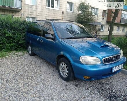 Синій Кіа Карнівал, об'ємом двигуна 2.92 л та пробігом 300 тис. км за 1999 $, фото 1 на Automoto.ua