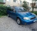 Синій Кіа Карнівал, об'ємом двигуна 2.92 л та пробігом 300 тис. км за 1999 $, фото 1 на Automoto.ua
