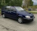 Синий Киа Карнивал, объемом двигателя 2.9 л и пробегом 230 тыс. км за 2600 $, фото 1 на Automoto.ua