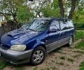 Синий Киа Карнивал, объемом двигателя 2.9 л и пробегом 329 тыс. км за 2300 $, фото 1 на Automoto.ua