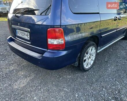 Синий Киа Карнивал, объемом двигателя 2.9 л и пробегом 260 тыс. км за 4550 $, фото 10 на Automoto.ua
