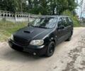 Синий Киа Карнивал, объемом двигателя 2.9 л и пробегом 227 тыс. км за 1800 $, фото 1 на Automoto.ua