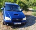 Синий Киа Карнивал, объемом двигателя 2.9 л и пробегом 221 тыс. км за 3500 $, фото 1 на Automoto.ua