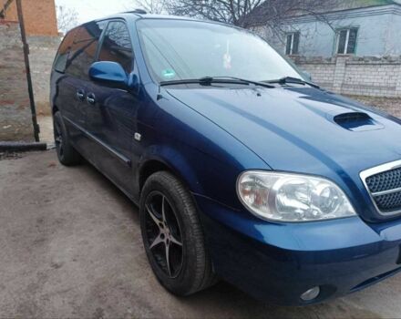 Синий Киа Карнивал, объемом двигателя 2.5 л и пробегом 267 тыс. км за 3500 $, фото 1 на Automoto.ua