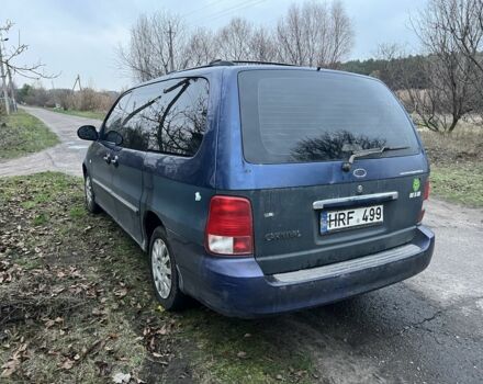 Синий Киа Карнивал, объемом двигателя 2.9 л и пробегом 260 тыс. км за 2900 $, фото 5 на Automoto.ua