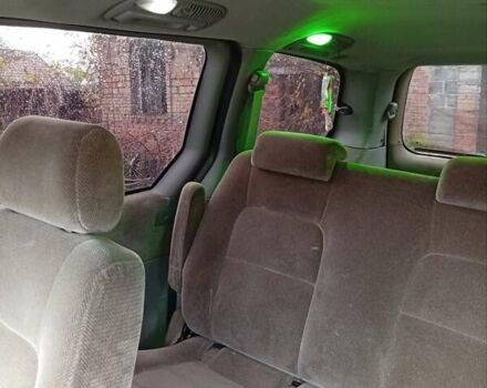 Синий Киа Карнивал, объемом двигателя 2.9 л и пробегом 367 тыс. км за 1800 $, фото 2 на Automoto.ua