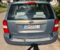 Синий Киа Карнивал, объемом двигателя 2.9 л и пробегом 350 тыс. км за 3800 $, фото 3 на Automoto.ua