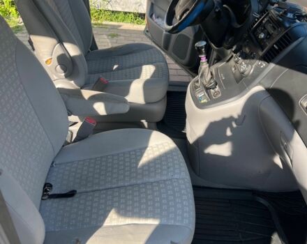 Синий Киа Карнивал, объемом двигателя 2.9 л и пробегом 350 тыс. км за 3800 $, фото 6 на Automoto.ua