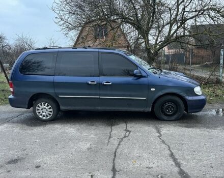 Синий Киа Карнивал, объемом двигателя 2.9 л и пробегом 260 тыс. км за 2900 $, фото 2 на Automoto.ua