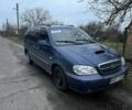 Синий Киа Карнивал, объемом двигателя 2.9 л и пробегом 260 тыс. км за 2900 $, фото 1 на Automoto.ua